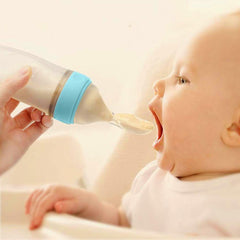 INFANT BABY TRAINING SPOON RICE PASTE BOTTLE SILICONE SQUEEZE SPOON