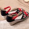 Image of GONGYIBUXIE OPEN TOE FLORAL PATTERN EMBRO CANVAS SANDALS