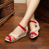 Image of GONGYIBUXIE OPEN TOE FLORAL PATTERN EMBRO CANVAS SANDALS