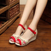 Image of GONGYIBUXIE OPEN TOE FLORAL PATTERN EMBRO CANVAS SANDALS